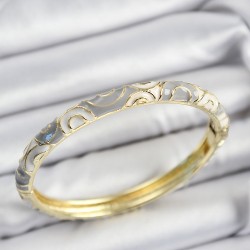 Mineli Pirinç Gri Ve Beyaz Sarmal Motifli Gold Renk Kadın Kelepçe