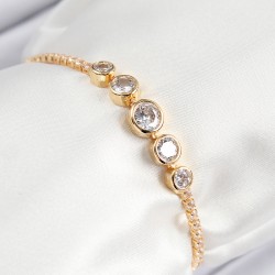 Pirinç Zirkon Taşlı Sıralı Daire Model Gold Renk Asansörlü Kadın Bileklik