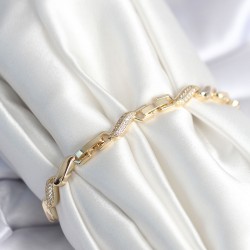 Pirinç Gold Renk Zirkon Taşlı Sarmal Model Kadın Bileklik