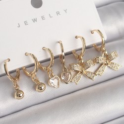 Pirinç Gold Renk Sallantı Zirkon Taşlı Kurdele Model Kalp Detay Kadın Küpe Seti