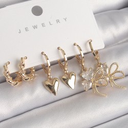 Pirinç Gold Renk Sallantı Zirkon Taşlı Düğüm Yonca Model Kalp Detay Kadın Küpe Seti