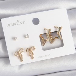 Pirinç Gold Renk Zirkon Taşlı Yıldız Model Fiyonk Detay 3 Çift Kadın Küpe Seti