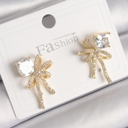 Pirinç Gold Renk Zirkon Taşlı Kurdele Model Kadın Küpe